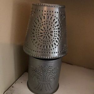 Pierced tin candle holder